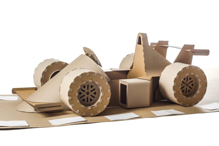 Photo,Of,Cardboard,Racing,Car,On,White,Background